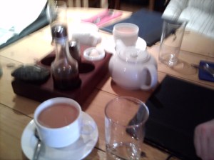 If this wasn't so blurry, you could see the tea and the cute seashell used for spooning out the salt.